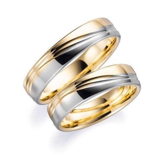 Klassiske Aagaard vielsesringe i 14 karat guld og hvidguld med graverede bølgede linjer – 5 mm brede.
